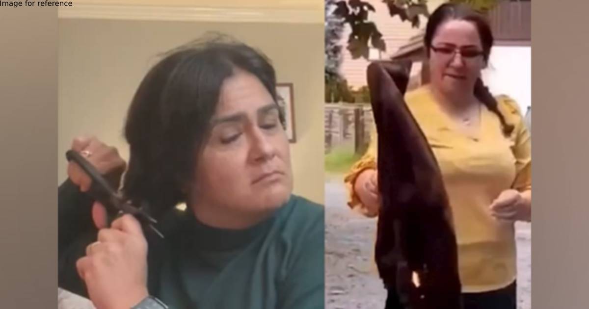 Iranian women chop off hair, burn hijabs to mark protest over death of Mahsa Amini